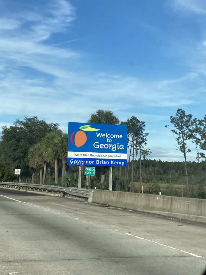 A Welcome To Georgia sign on I-95 at the Florida-Georgia Line