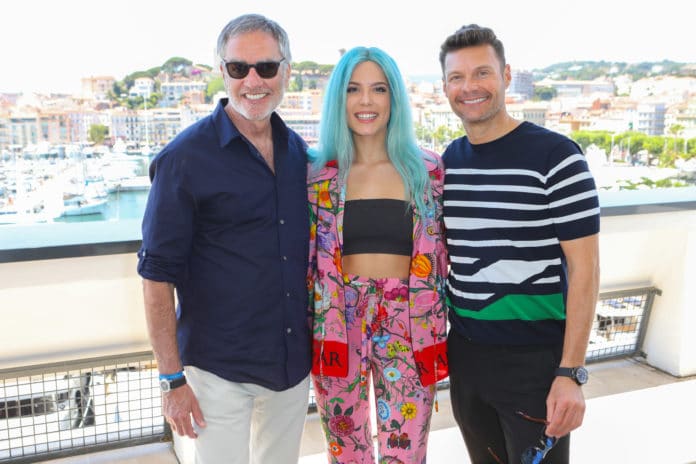 iHeartMedia Chairman/CEO Bob Pittman, recording artist Halsey and iHeart air personality Ryan Seacrest pose after the company's 