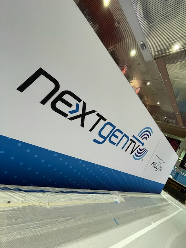 The NextGenTV team sets up its booth at the Las Vegas Convention Center for CES 2022