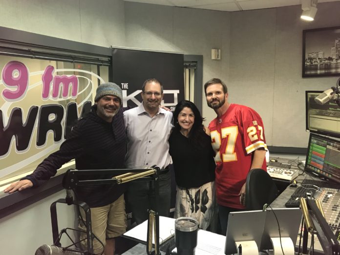 RBR+TVBR Editor-in-Chief Adam R Jacobson (second from left) poses with members of the KVJ Show at WRMF-FM in West Palm Beach in this January 2020 file photo.